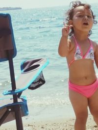 Woman with sunglasses on beach