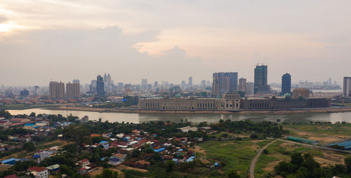 High angle view of buildings in city against sky