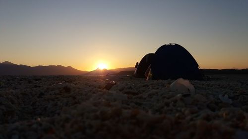 Scenic view of landscape against sky during sunset