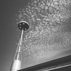 Low angle view of street light against sky