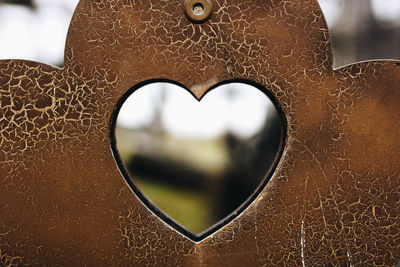 Close-up of heart shape on window