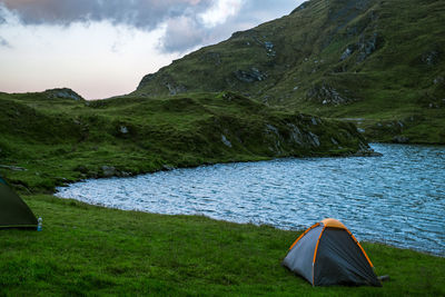 Sunrise on fagaras high mountain ridge. romanian mountain landscape with high peaks over 2200m
