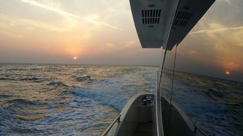 Scenic view of sea against sky at sunset