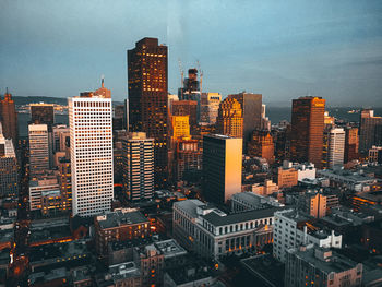 Aerial view of illuminated buildings in san francisco against sky in the morning