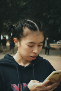 Close-up of boy looking down