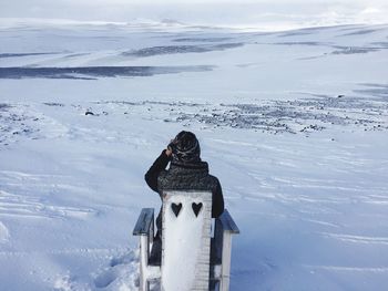 Scenic view of snow covered landscape against sky