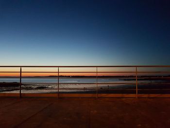 Scenic view of beach against clear sky