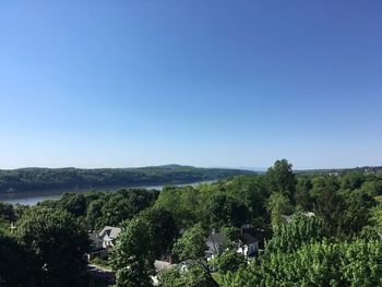 Scenic view of landscape against clear blue sky