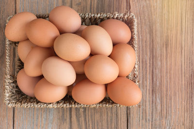 High angle view of eggs in container on table