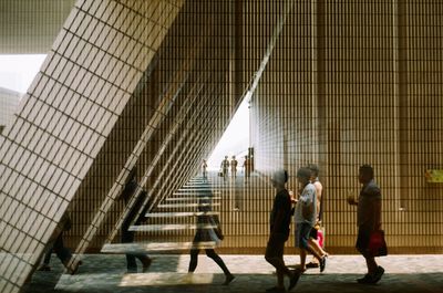 People walking in modern office building