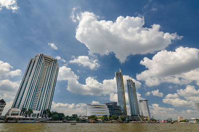 Low angle view of modern buildings against sky