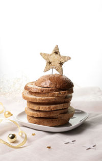 Italian food. christmas gourmet panettone isolated on white background. christmas decorations.