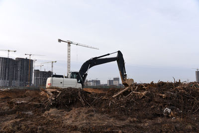 Construction site on field against clear sky