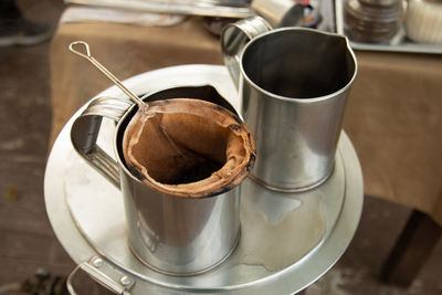 High angle view of coffee cup on table