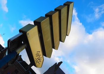 Low angle view of built structure against blue sky