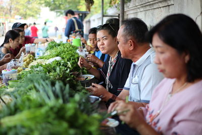 Group of people in market