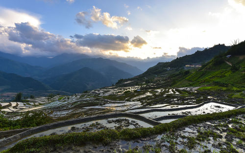 Scenic view of mountains against sky during sunset