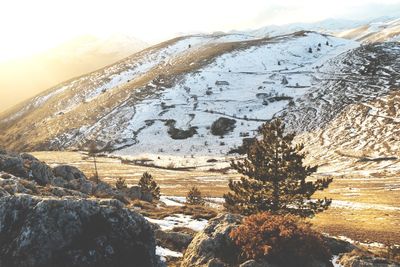 Scenic view of snowcapped mountains against sky