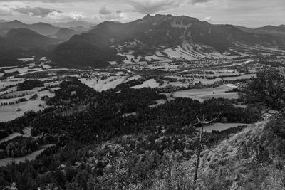 High angle view of trees and mountains against sky