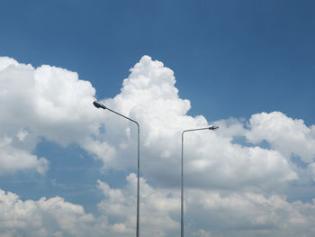 Low angle view of street light against sky