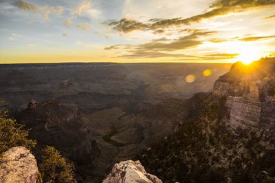 Scenic view of landscape against sky during sunset