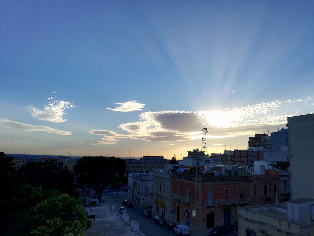 architecture, building exterior, built structure, sunset, sky, residential building, city, cloud - sky, no people, outdoors, cityscape, nature, day, city location