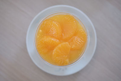 High angle view of lemon in glass on table