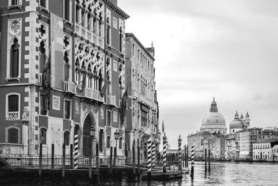 Buildings in city against sky