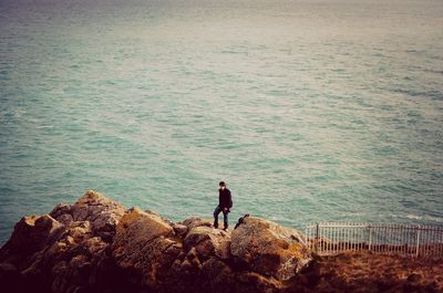 People standing on rocks