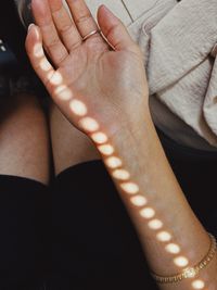 Low section of woman with henna tattoo