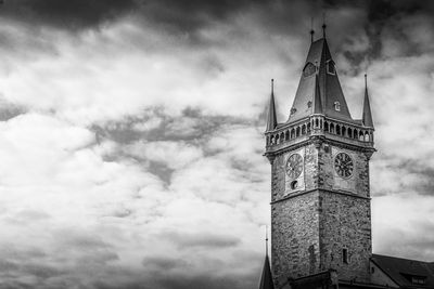 Low angle view of clock tower against sky