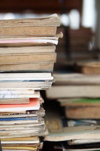 Close-up of old stacked books