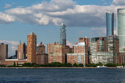 Buildings in city against sky