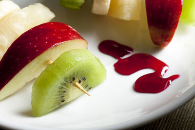 Close-up of fruits in plate