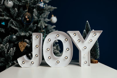 Close-up of christmas tree on table