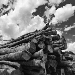 Low angle view of stack of rocks against sky