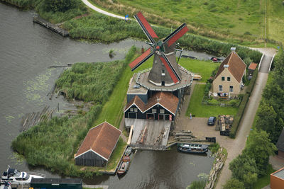High angle view of traditional windmill by trees