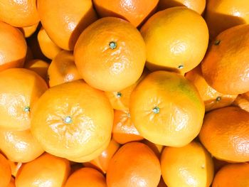 Full frame shot of oranges in market