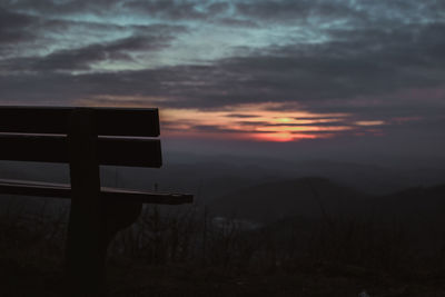 Silhouette landscape against sky during sunset