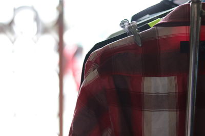 Close-up of clothes hanging against blurred background