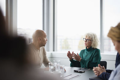 People talking during business meeting