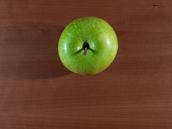 High angle view of apple on table