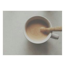 Close-up of coffee cup on table