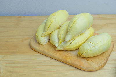 High angle view of bananas on cutting board