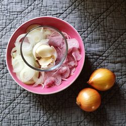 Directly above shot of chopped onions in bowl