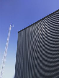 Low angle view of modern building against clear sky