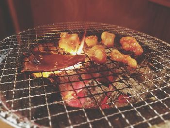 Close-up of meat on barbecue grill