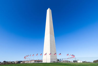 Low angle view of monument against blue sky