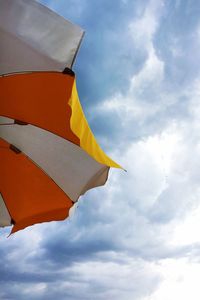 Low angle view of flag against sky