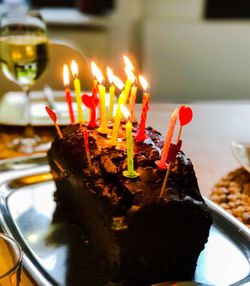 Burning candles on cake